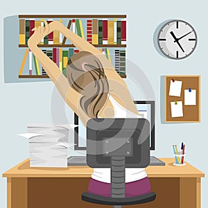 Back view of young woman sitting and stretching on workplace in office or at home