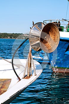 Back of a wheel on fishing boat with all its collected networks