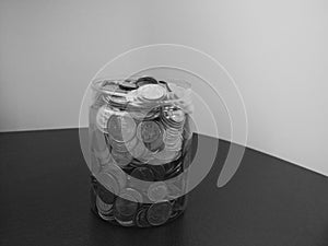 Back and white jar of change