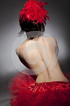 Back of woman in red tutu