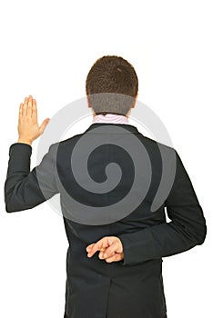 Back of young businessman liar photo