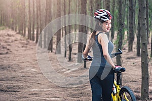 Back young female woman helmet catch bicycle
