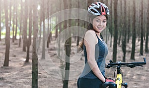 Back young female woman helmet catch bicycle