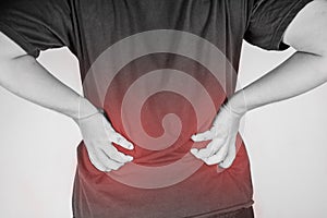 Backache injury in humans .backache pain,joint pains people medical, mono tone highlight at backache