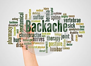 Backache word cloud and hand with marker concept