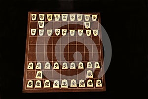 Backboard and pieces of Shogi