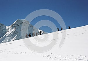 Backcountry snowborders photo