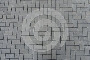 Backdrop - grey concrete pavement with herringbone layout