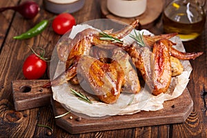 Backed Chicken wings served with rosemary.