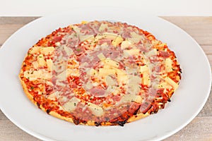 Backed pizza with pinapple and ham