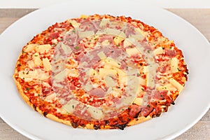 Backed pizza with pinapple and ham