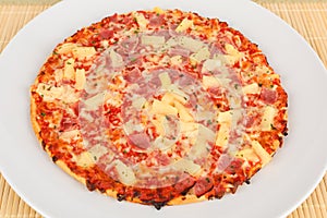Backed pizza with pinapple and ham