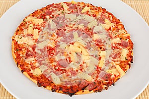 Backed pizza with pinapple and ham