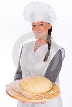 Backer with bread dough