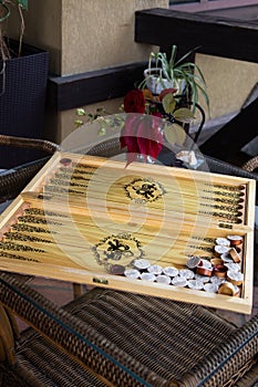 Backgammon board on a glass table