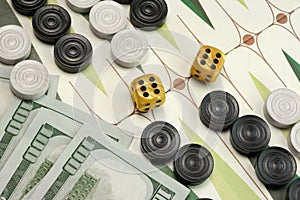 Backgammon Cardboard Playing Area, Wood Chips, Money And Two Dices photo