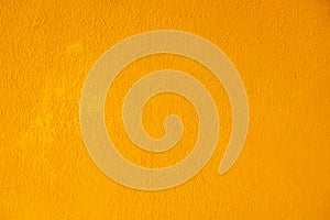 close up of neon bright semi smooth stucco wall texture background