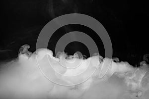Background of abstract grey color smoke isolate on black color background.