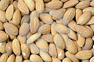 Background with almonds. Close up.