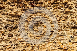 Background of ancient stone wall. Texture of old brick