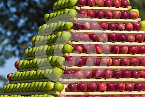 Background of apples. Stand of ripe fruit.