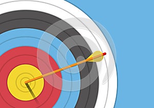 Background : archery target with an arrow