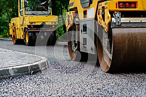 Background of asphalt roller that stack and press hot asphalt. Road repair machine