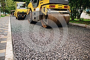 Background of asphalt roller that stack and press hot asphalt. Road repair machine