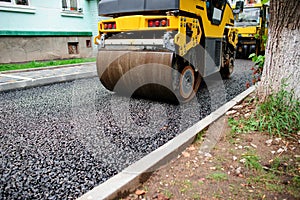 Background of asphalt roller that stack and press hot asphalt. Road repair machine