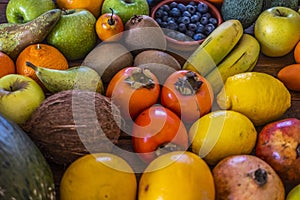 Background with an assortment of healthy freshly picked fresh fruit. Vegan or vegetarian choice