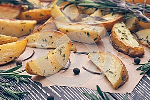 Background with baked potatoes with rosemary