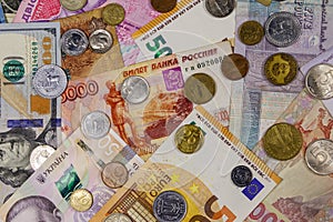 Background of banknotes and coins from different countries