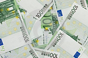 Background of banknotes in nominal value of one hundred euros. T