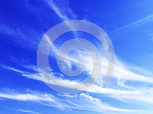 Background, beautiful cirrus clouds on a bright blue-blue sky