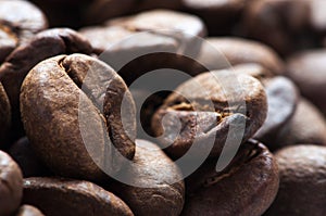 Background of big roasted coffee beans