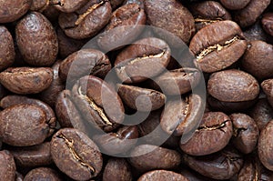 Background of big roasted coffee beans