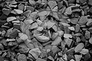 Background of black and white gravel rock.