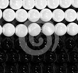 background of black and white pearls