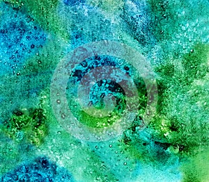 The background is blue-green in the style of grunge. Abstract background.