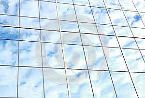 Background of blue sky reflect on glasses from business buildin