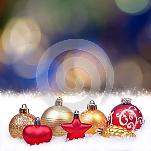 Background with blue, yellow and white bokeh lights, christmas balls and stars