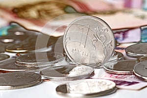 Background, blur, out of focus, bokeh, pasteurization. Coins of the Russian ruble. The rise of the ruble exchange rate