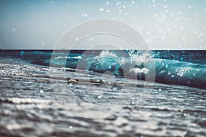 background of blurred beach and sea waves with bokeh