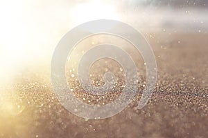 background of blurred beach and sea waves with bokeh lights