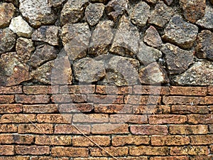 Background of brick and stone wall texture. Close-up image.