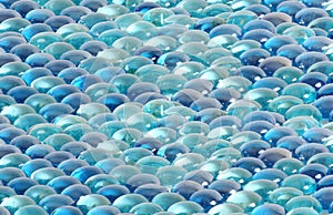 Background of brilliant blue glass stones