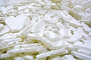 Background from broken pieces of ice. Texture, pattern, closeup