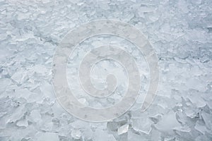 Background from broken pieces of ice. Texture, pattern, closeup
