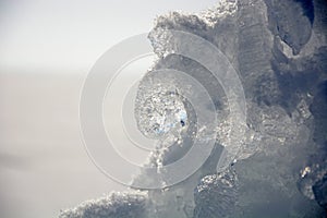 Background from broken pieces of ice. Texture, pattern, closeup