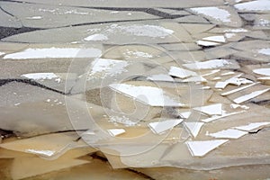 Background from broken pieces of ice. Texture, pattern, closeup